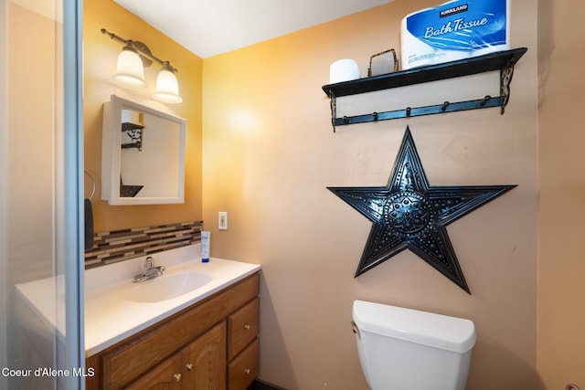 5841 W Clemetson Rd, Coeur Dalene, ID 83814 - bathroom featuring vanity and decorative backsplash