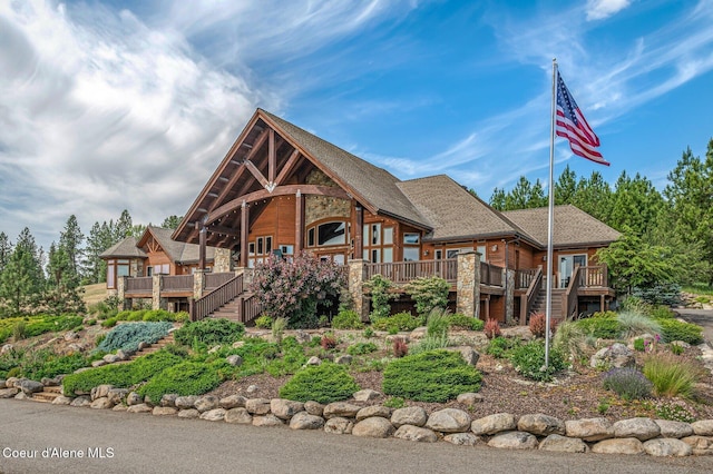 5841 W Clemetson Rd, Coeur Dalene, ID 83814 - view of front of property featuring stairs, stone siding, and a wooden deck