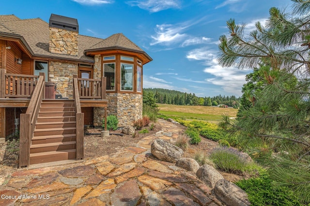 5841 W Clemetson Rd, Coeur Dalene, ID 83814 - view of patio / terrace featuring stairs and a deck