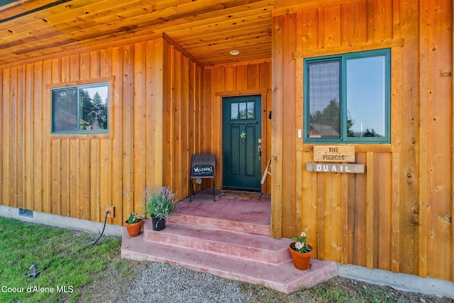 64 Heights Loop, Bonners Ferry, ID 83805 - doorway to property featuring board and batten siding