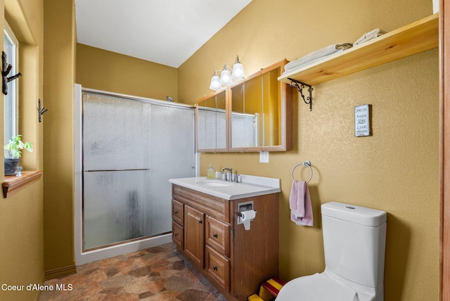 64 Heights Loop, Bonners Ferry, ID 83805 - bathroom featuring vanity, a shower stall, and stone finish flooring