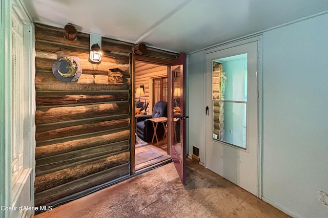1283 N Wrenco Rd, Sandpoint, ID 83864 - doorway featuring log walls