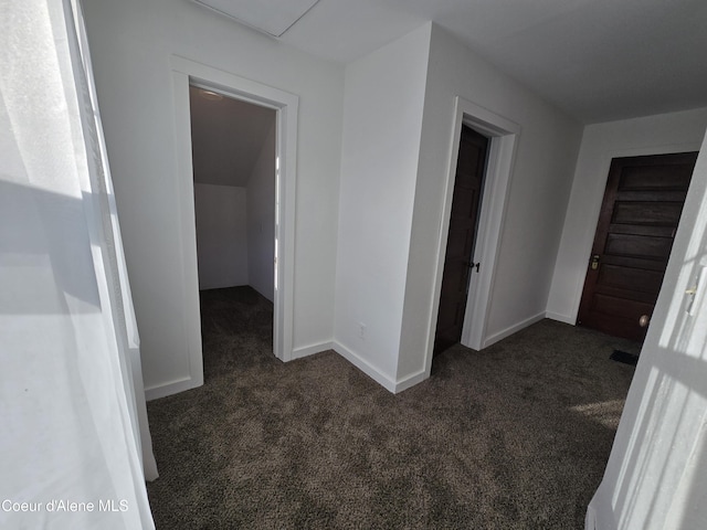312 Park St, Mullan, ID 83846 - corridor featuring dark carpet and baseboards