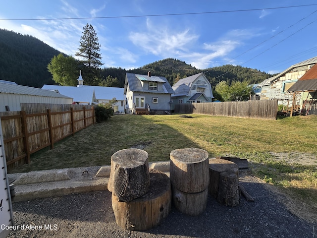 312 Park St, Mullan, ID 83846 - view of yard featuring a mountain view