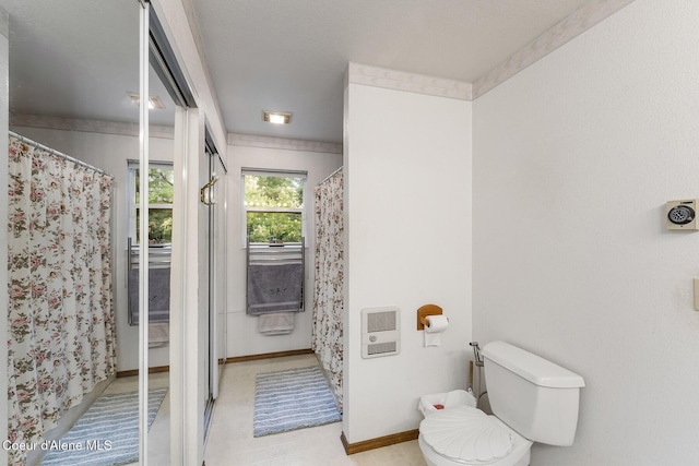 7605 W Sanders Rd, Coeur Dalene, ID 83814 - bathroom with heating unit and a shower with curtain