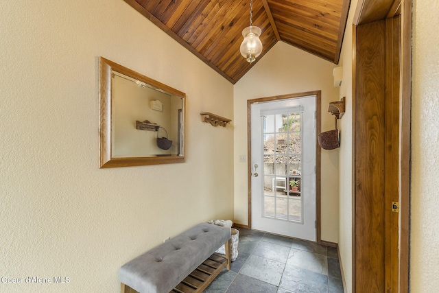 7605 W Sanders Rd, Coeur Dalene, ID 83814 - doorway to outside with wood ceiling, vaulted ceiling, and stone tile flooring