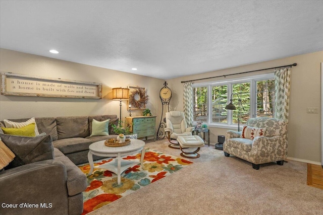 12321 N Sherwood Ct, Hayden, ID 83835 - living room featuring recessed lighting, carpet flooring, and a textured ceiling