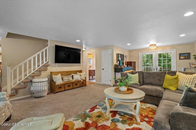 12321 N Sherwood Ct, Hayden, ID 83835 - living area with carpet flooring, french doors, stairs, recessed lighting, and a textured ceiling
