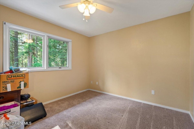 12321 N Sherwood Ct, Hayden, ID 83835 - carpeted spare room featuring a ceiling fan and baseboards