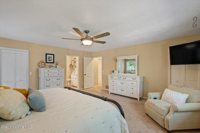 12321 N Sherwood Ct, Hayden, ID 83835 - bedroom featuring carpet floors, ceiling fan, and ensuite bath