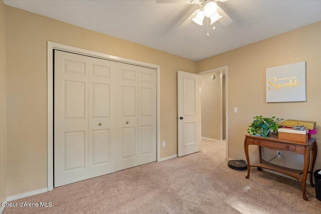 12321 N Sherwood Ct, Hayden, ID 83835 - bedroom with light carpet, a closet, and ceiling fan