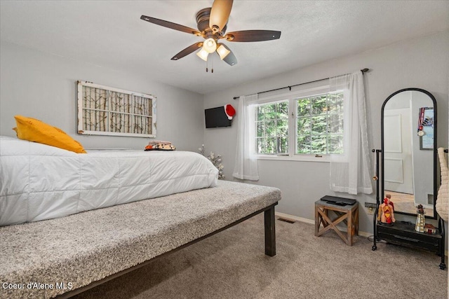 12321 N Sherwood Ct, Hayden, ID 83835 - bedroom featuring carpet floors and a ceiling fan