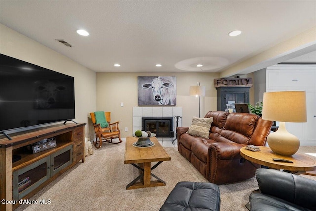12321 N Sherwood Ct, Hayden, ID 83835 - living area with a fireplace, light colored carpet, and recessed lighting