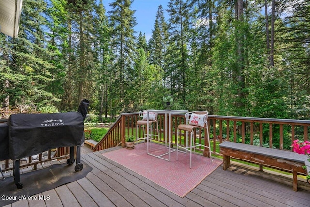 12321 N Sherwood Ct, Hayden, ID 83835 - wooden terrace with grilling area