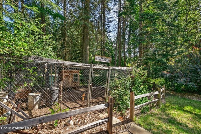 12321 N Sherwood Ct, Hayden, ID 83835 - view of yard with exterior structure and an outbuilding