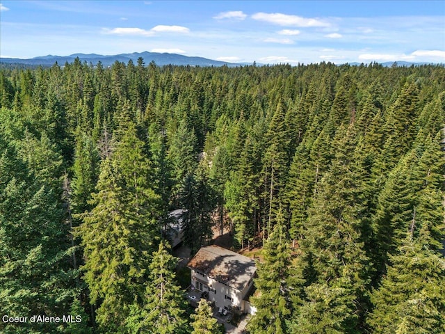 12321 N Sherwood Ct, Hayden, ID 83835 - mountain view featuring a heavily wooded area
