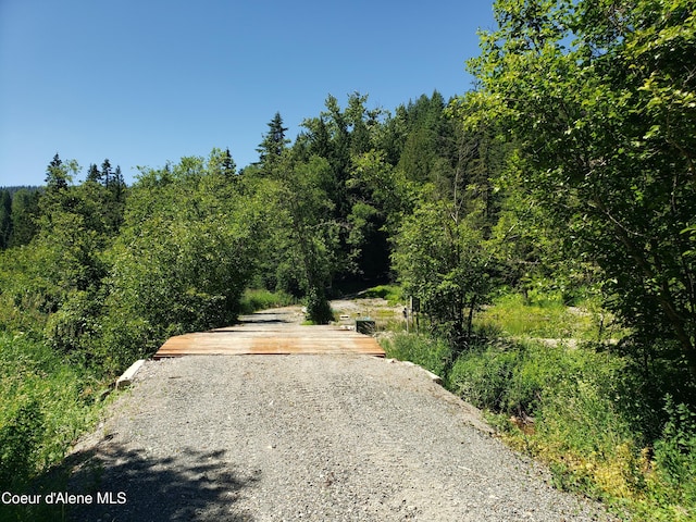 1007 Ruby Creek Rd, Naples, ID 83847 - view of road featuring a wooded view