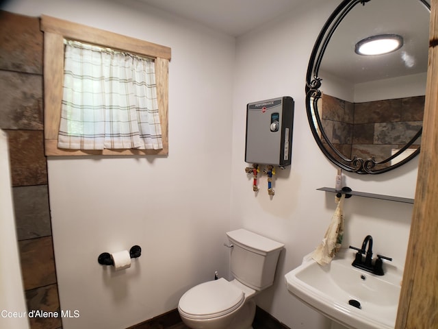 1007 Ruby Creek Rd, Naples, ID 83847 - bathroom with toilet and water heater