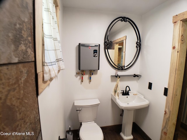 1007 Ruby Creek Rd, Naples, ID 83847 - bathroom with toilet and wood finished floors