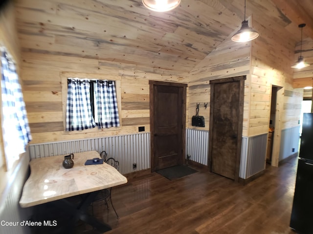 1007 Ruby Creek Rd, Naples, ID 83847 - interior space with vaulted ceiling, wood walls, wood ceiling, and dark wood-type flooring