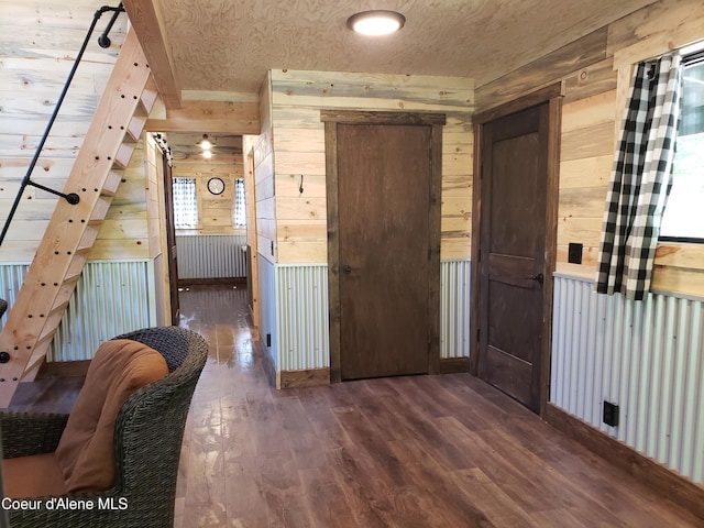 1007 Ruby Creek Rd, Naples, ID 83847 - entrance foyer with wooden walls and hardwood / wood-style flooring