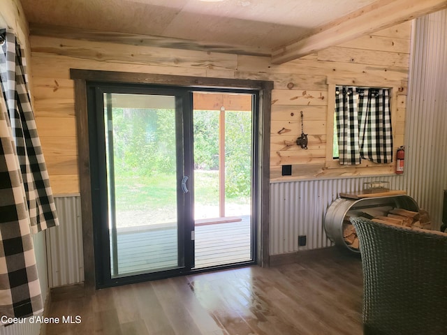1007 Ruby Creek Rd, Naples, ID 83847 - entryway with wood walls, wood finished floors, and beamed ceiling