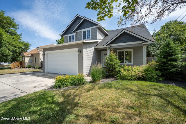 120 E Walnut Ave, Coeur Dalene, ID 83814 - craftsman house featuring driveway and a front lawn