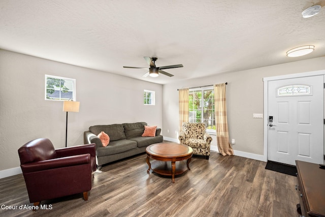 120 E Walnut Ave, Coeur Dalene, ID 83814 - living area featuring dark wood-type flooring, a ceiling fan, and a textured ceiling