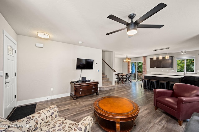 120 E Walnut Ave, Coeur Dalene, ID 83814 - living area featuring stairway, dark wood finished floors, and healthy amount of natural light