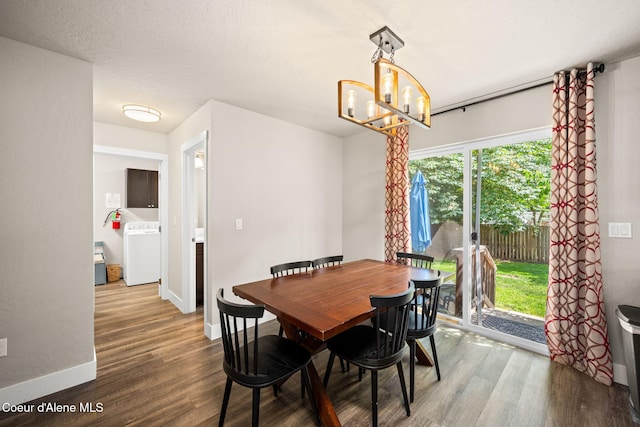 120 E Walnut Ave, Coeur Dalene, ID 83814 - dining area with washer / clothes dryer, wood finished floors, and a chandelier