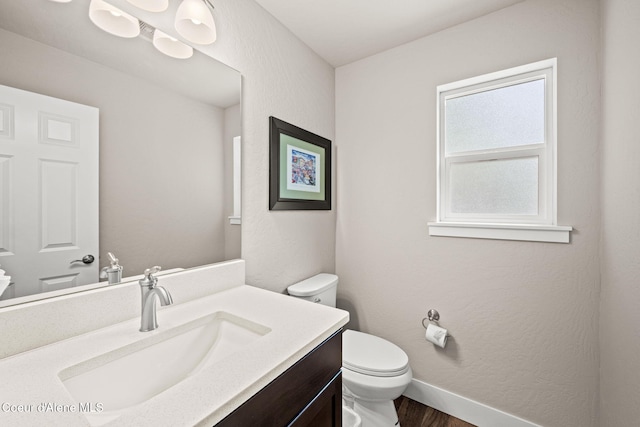 120 E Walnut Ave, Coeur Dalene, ID 83814 - half bath with vanity and wood finished floors