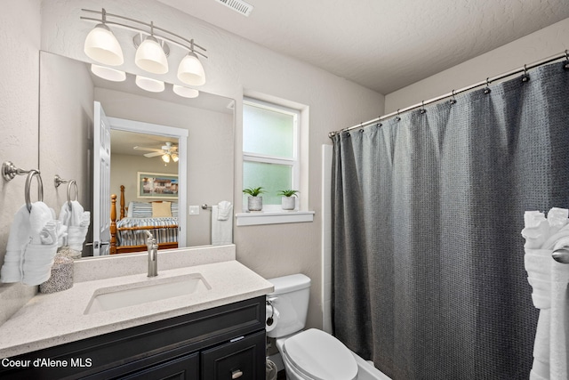 120 E Walnut Ave, Coeur Dalene, ID 83814 - bathroom with vanity, a shower with curtain, and a ceiling fan