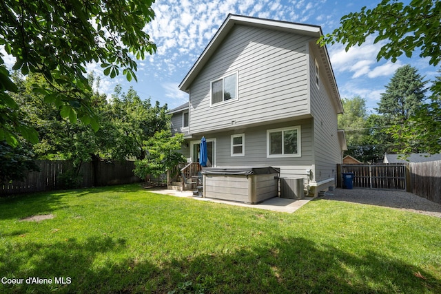 120 E Walnut Ave, Coeur Dalene, ID 83814 - back of property with a fenced backyard and a patio