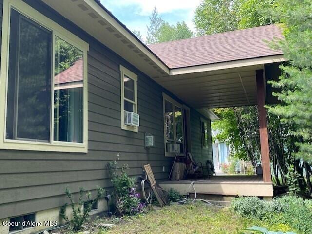 4310 Burns Ct, Sandpoint, ID 83864 - view of property exterior featuring a wooden deck and roof with shingles