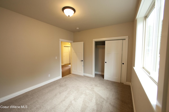 4310 Burns Ct, Sandpoint, ID 83864 - unfurnished bedroom with light colored carpet and a closet