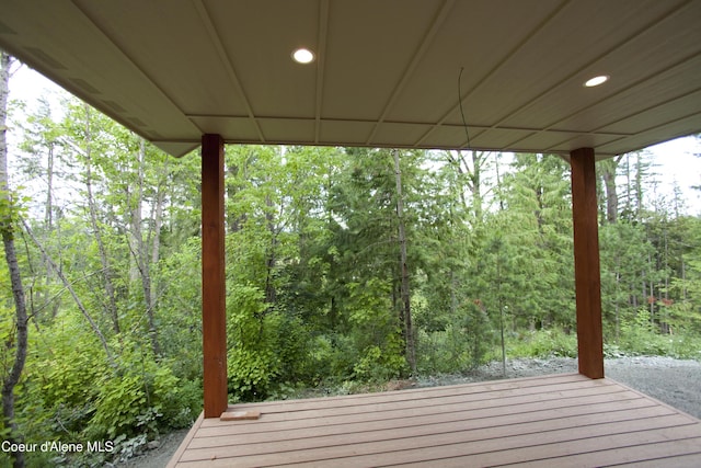 4310 Burns Ct, Sandpoint, ID 83864 - wooden deck with a wooded view