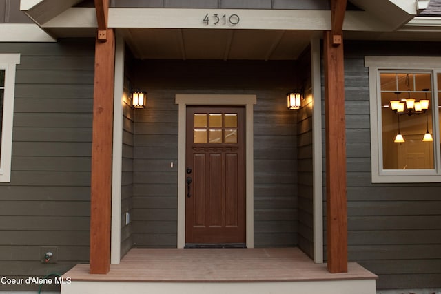 4310 Burns Ct, Sandpoint, ID 83864 - view of exterior entry featuring covered porch