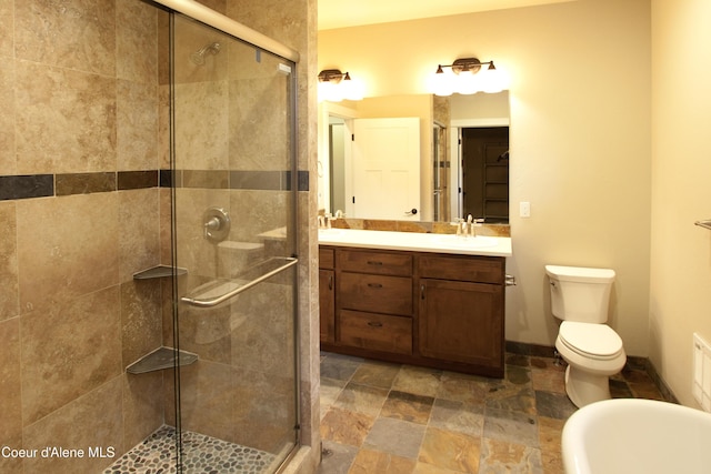 4310 Burns Ct, Sandpoint, ID 83864 - full bath with a stall shower, double vanity, and stone finish flooring