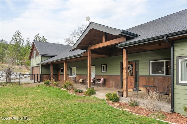 3772 S Schilling Loop, Post Falls, ID 83854 - back of property with roof with shingles