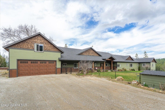 3772 S Schilling Loop, Post Falls, ID 83854 - view of front of house featuring driveway and a garage