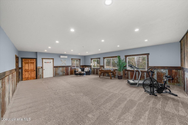 3772 S Schilling Loop, Post Falls, ID 83854 - living area featuring carpet floors, a wainscoted wall, recessed lighting, a wall mounted air conditioner, and wood walls