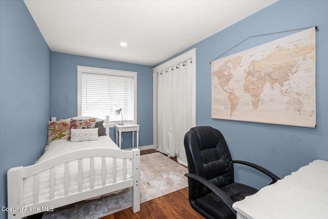 3772 S Schilling Loop, Post Falls, ID 83854 - bedroom with wood finished floors, a desk, and recessed lighting