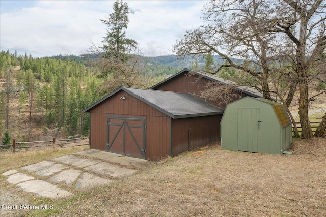 3772 S Schilling Loop, Post Falls, ID 83854 - view of shed featuring a view of trees
