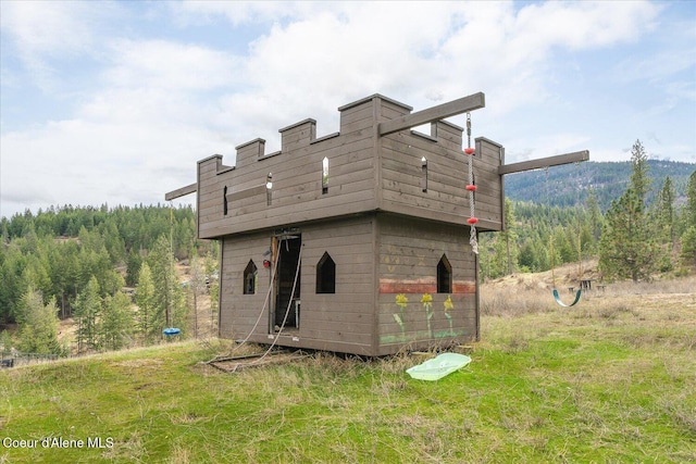 3772 S Schilling Loop, Post Falls, ID 83854 - view of outbuilding with a view of trees