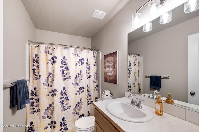 10413 N Belgrave Loop, Hayden, ID 83835 - bathroom featuring vanity and a shower with curtain