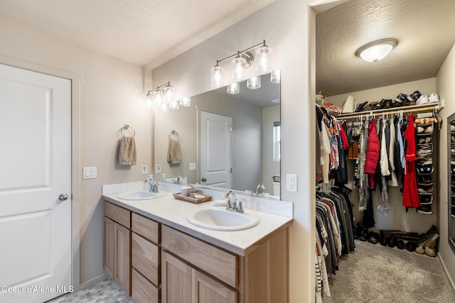 10413 N Belgrave Loop, Hayden, ID 83835 - full bathroom with double vanity and a spacious closet