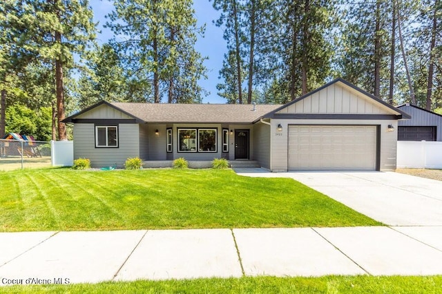 3420 N 19th St, Coeur Dalene, ID 83815 - single story home featuring an attached garage, concrete driveway, and board and batten siding