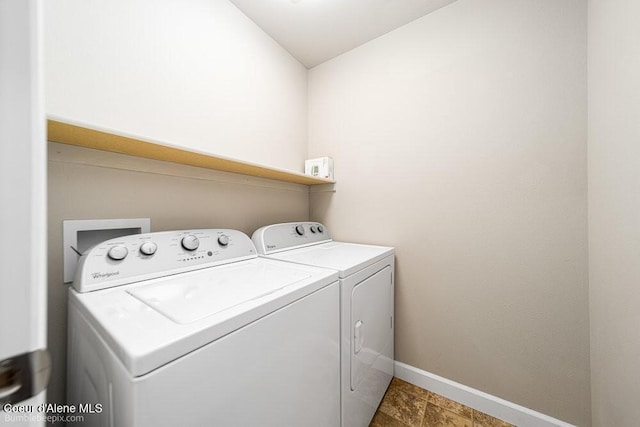 3420 N 19th St, Coeur Dalene, ID 83815 - washroom featuring baseboards and washer and clothes dryer