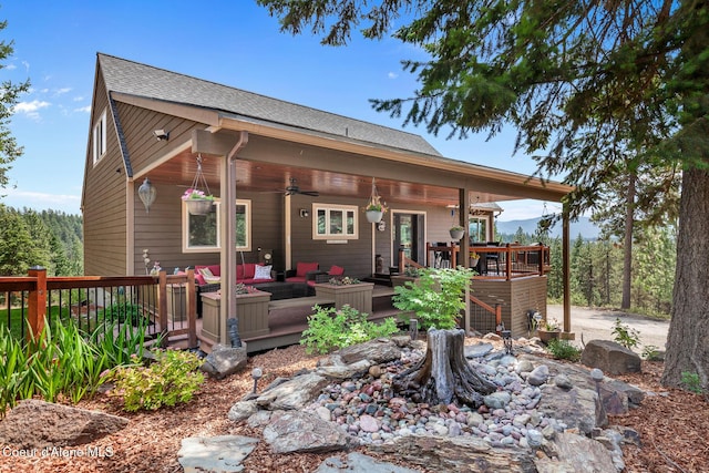 1529 S Saddleback Dr, Coeur Dalene, ID 83814 - back of house featuring a ceiling fan, a deck, an outdoor hangout area, and a shingled roof