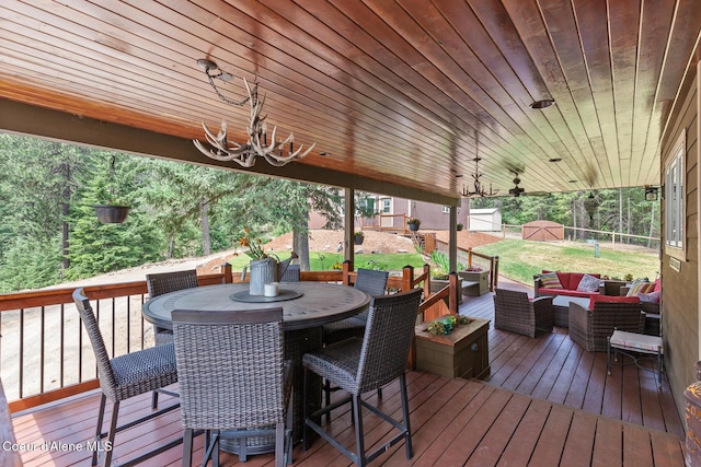 1529 S Saddleback Dr, Coeur Dalene, ID 83814 - wooden deck with an outdoor living space and outdoor dining space